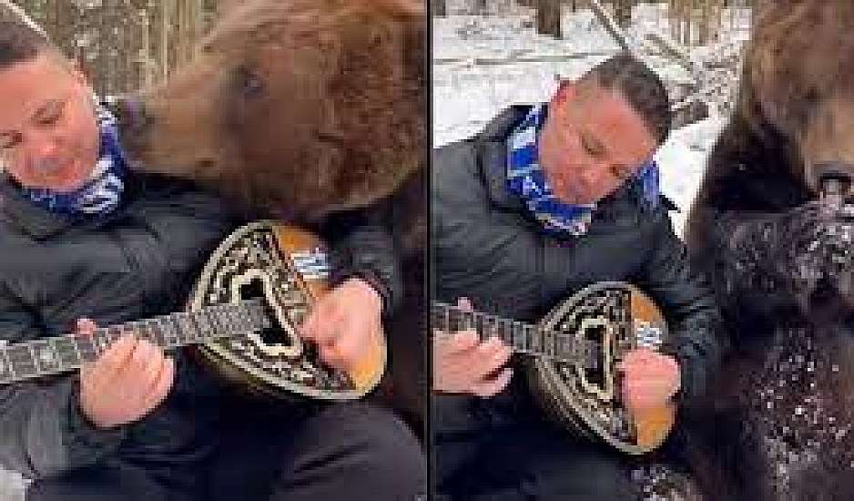 Λαρισαίος έγινε viral παίζοντας μπουζούκι στα χιόνια της Ρωσίας με μια αρκούδα δίπλα του!