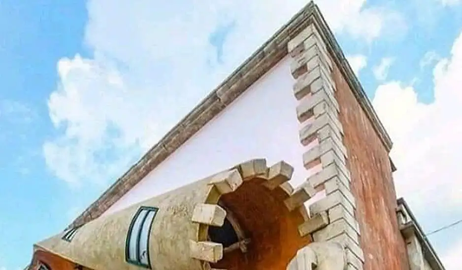 Το κτήριο που ανοίγει με φερμουάρ: Η τέχνη του δρόμου στα καλύτερά της