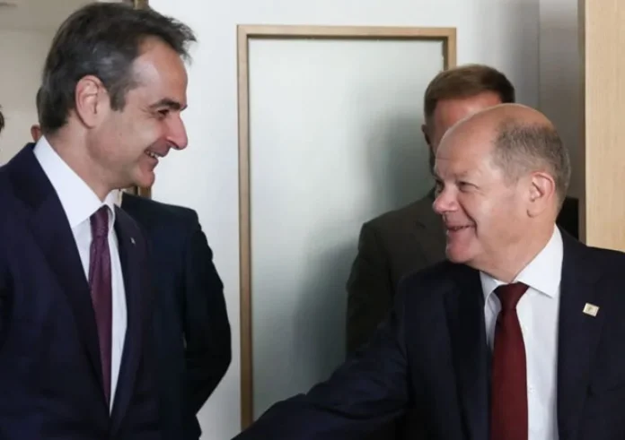 DW: Η διαχείριση της κρίσης στο επίκεντρο της επίσκεψης Σολτς στη Θεσσαλονίκη
